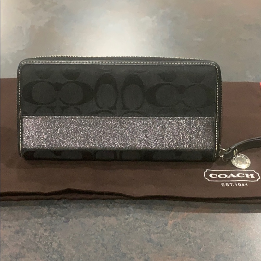 Coach Signature black C’s Silver Stripe Zip Wallet
